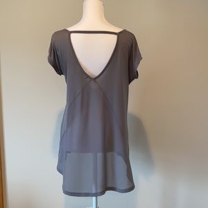 August Silk Short sleeved, loose fitting, pocket tee.